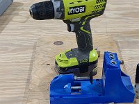 2022-03-21 14.00.30  Suggested tool: Kreg Pocket Screw setup.  The blue thing just in front of the power drill lets you make precision oblique holes in wood that accept special pocket screws.  You can make nearly invisible, nearly watertight wood joints with Pocket Screws.  The big claw looking thing is used to hold two pieces of wood together when installing pocket screws into your newly drilled holes.